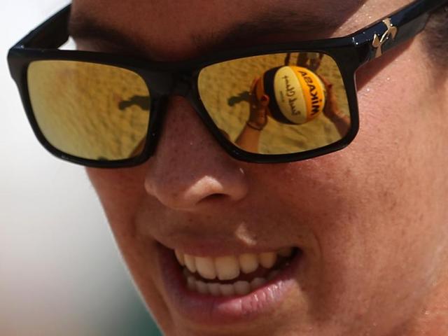 Spain's Elsa Baquerizo catches a ball during a women's beach volleyball match against Argentina. (AP)
