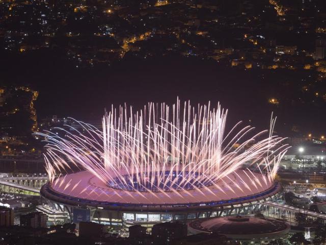 Vanderlei Cordeiro de Lima prepares to light the Olympic flame during the opening ceremony of the Rio Games on Friday.(Reuters)