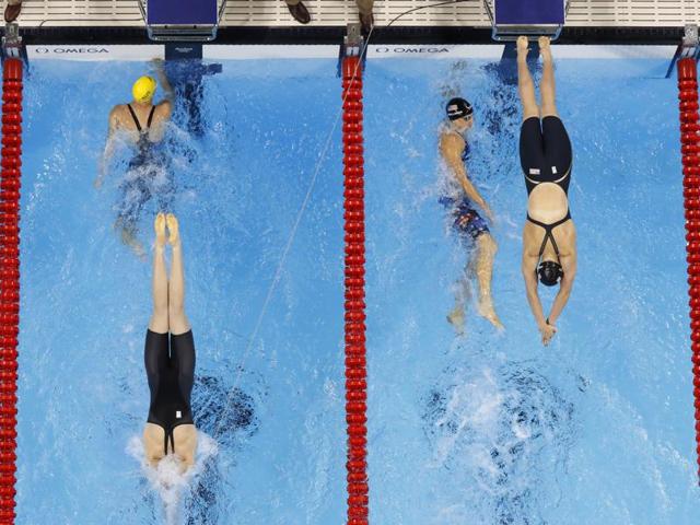 Australia's Cate Campbell starts her final leg of the 4 x 100m freestyle championship final. The team were perfectly synchronised up until the final second. (AP) Australia's Cate Campbell starts her final leg of the 4 x 100m freestyle championship final. The team were perfectly synchronised up until the final second. (AP)