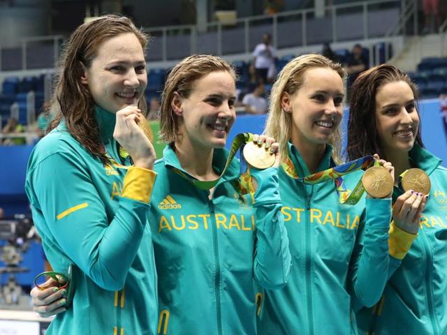 PEARLY WHITES: Sisters Cate Campbell and Bronte Campbell, Emma McKeon and Brittany Elmslie, from left, hold their gold medals. (AP) PEARLY WHITES: Sisters Cate Campbell and Bronte Campbell, Emma McKeon and Brittany Elmslie, from left, hold their gold medals. (AP)