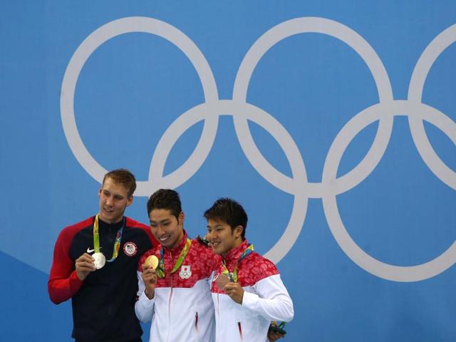 Men's 400m Individual Medley Gold medallist Kosuke Hagino of Japan poses with silver medallist Chase Kalisz of USA and bronze medallist Daiya Seto of Japan. (REUTERS) Men's 400m Individual Medley Gold medallist Kosuke Hagino of Japan poses with silver medallist Chase Kalisz of USA and bronze medallist Daiya Seto of Japan. (REUTERS)