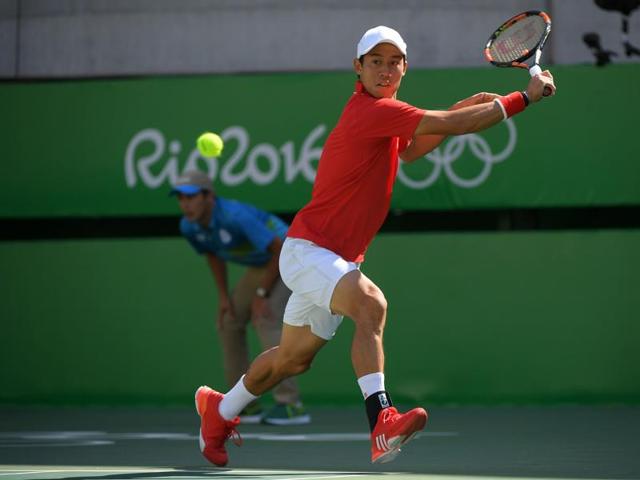 Kei Nishikori of Japan came up with one of the most exciting bits of in play in Day 1, when he dropped his racket after hitting a serve, but scrambled to pick it up in time to return the ball to his opponent and eventually winning the point and the match . (REUTERS) Kei Nishikori of Japan came up with one of the most exciting bits of in play in Day 1, when he dropped his racket after hitting a serve, but scrambled to pick it up in time to return the ball to his opponent and eventually winning the point and the match . (REUTERS)
