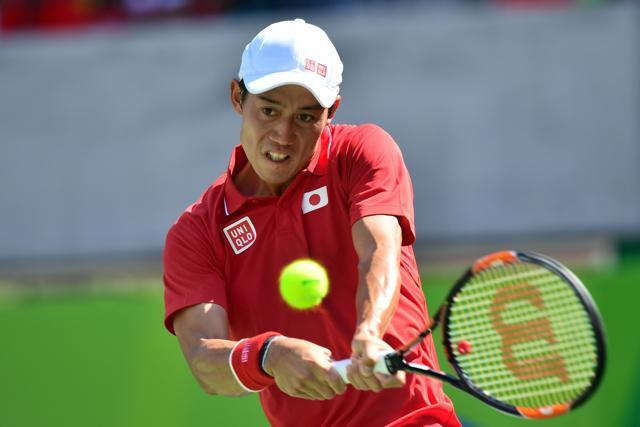 Japan's Kei Nishikori returns the ball to Spain's Alberto Ramos-Vinolas. (AFP Photo)