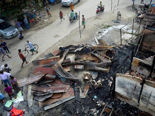 Debris of burnt shops after the terror attack at Balijan Tanali market in Kokrajhar on Saturday. (PTI) Debris of burnt shops after the terror attack at Balijan Tanali market in Kokrajhar on Saturday. (PTI)