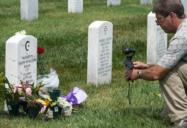 A TV cameramen takes video of the grave marker(L) for US Army Captain Humayun Saqib Muazzam Khan in Section 60 of Arlington National Cemetery in Arlington, Virginia. (AFP file photo) A TV cameramen takes video of the grave marker(L) for US Army Captain Humayun Saqib Muazzam Khan in Section 60 of Arlington National Cemetery in Arlington, Virginia. (AFP file photo)