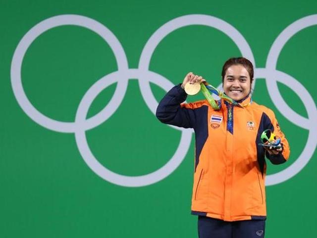 Sopita Tanasan of Thailand lifted 92kg in the snatch and 108kg in the clean and jerk for a total of 200kg win gold. (AP)