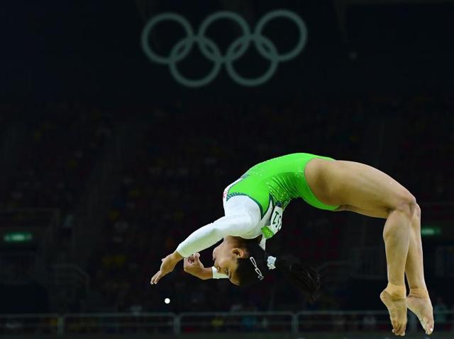 The girl from Tripura, who is the country’s first woman gymnast to qualify for the Olympics, managed to perform her much-appreciated ‘Produnova’ vault cleanly to secure 14.850 points after two attempts. (AFP Photo) The girl from Tripura, who is the country’s first woman gymnast to qualify for the Olympics, managed to perform her much-appreciated ‘Produnova’ vault cleanly to secure 14.850 points after two attempts. (AFP Photo)