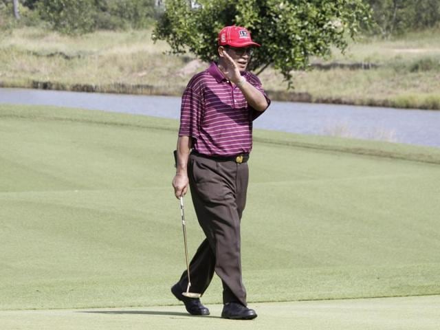 Cambodian Prime Minister Hun Sen walks on a golf course with Thailand's former Prime Minister Thaksin Shinawatra while playing golf as they play golf in Siem Reap, north of Phnom Penh, Cambodia. (AP) Cambodian Prime Minister Hun Sen walks on a golf course with Thailand's former Prime Minister Thaksin Shinawatra while playing golf as they play golf in Siem Reap, north of Phnom Penh, Cambodia. (AP)