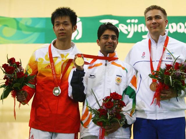 Silver medallist Zhu Qinan (left) was defending his gold at home that day but instead was reduced to tears after failing 0.8 point behind Bindra, who remains India’s sole individual gold medallist winner. Bronze medallist Henri Hakkinen of Finland is also in the picture. (Getty Images)