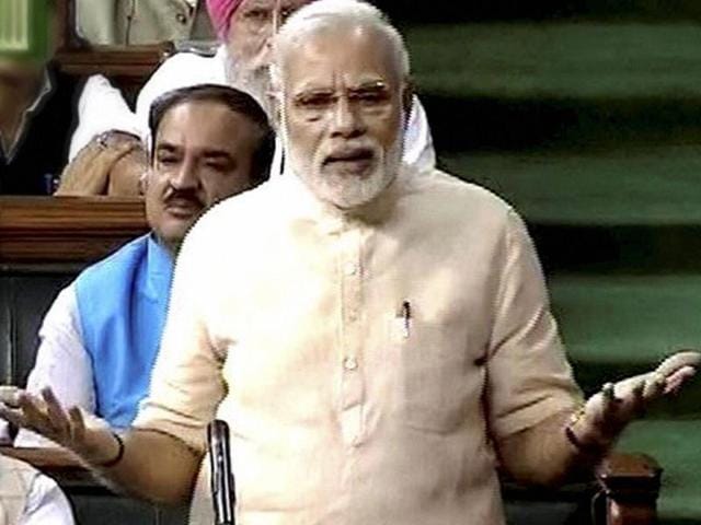A combination image of Prime Minister Narendra Modi and the board registering votes on the GST Bill in the Lok Sabha in new Delhi on Monday. (PTI Photo) A combination image of Prime Minister Narendra Modi and the board registering votes on the GST Bill in the Lok Sabha in new Delhi on Monday. (PTI Photo)
