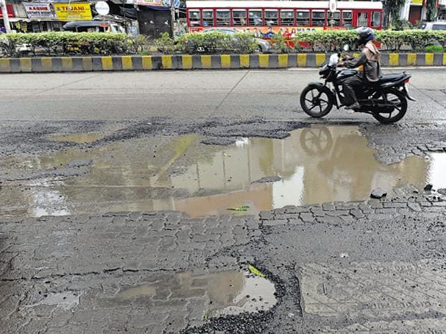 More than 2,500 potholes were reported last week.(HT Photo)