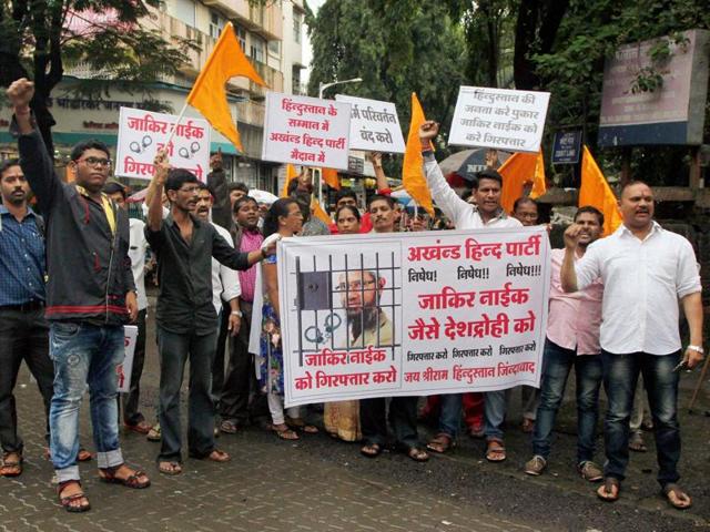 Protesters demand the arrest of Islamic preacher Zakir Naik in Mumbai. (PTI file photo) Protesters demand the arrest of Islamic preacher Zakir Naik in Mumbai. (PTI file photo)
