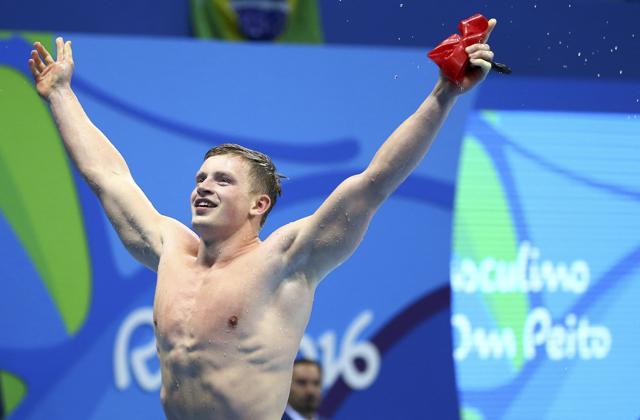 Great Britain’s Adam Peaty bettered hi own mark of 57.55 seconds in Saturday’s heats, sliced another hefty chunk off his mark to finish in 57.13 to win the gold. (REUTERS)