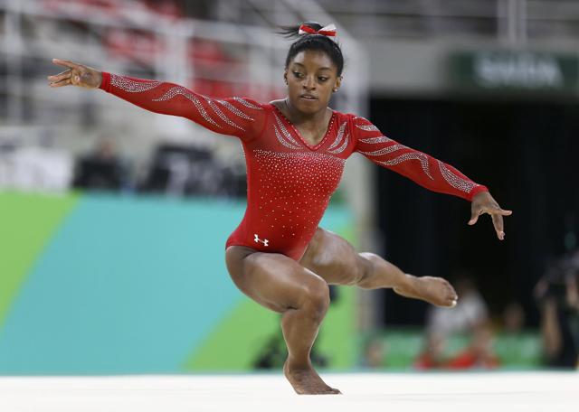 Simone Biles was back on form to capture the floor title with 15.966 points. (AP) Simone Biles was back on form to capture the floor title with 15.966 points. (AP)