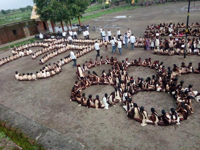 Children celebrate at Dattu Baban Bhokanal’s school in Talegaon. (HT Photo)