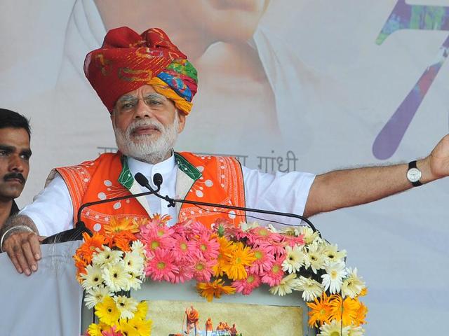 Prime Minister Narendra Modi addressing public rally at Jhotrada vilage in Alirajpur district in Madhya Pradesh on August 09, 2016.(Shankar Mourya/ HT Photo)