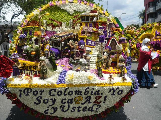 What is this? A tableau showing a residential area crafted with flowers. (AFP) What is this? A tableau showing a residential area crafted with flowers. (AFP)