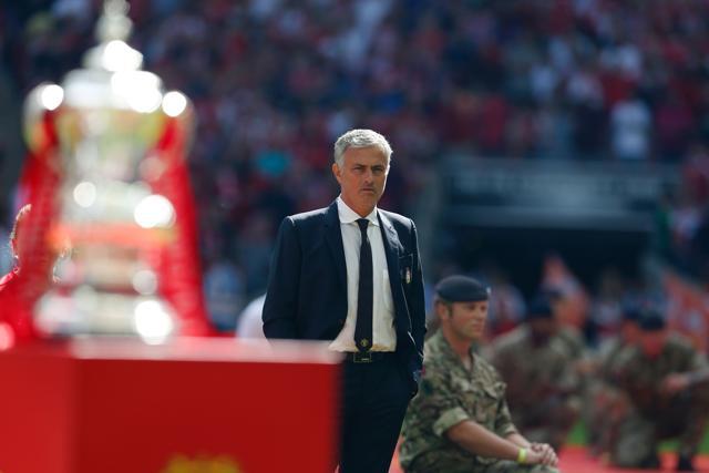 Manchester United's Portuguese manager Jose Mourinho (centre) stands by as the team's are introduced for the FA Community Shield football match against Leicester City at Wembley Stadium in London. (AFP Photo) Manchester United's Portuguese manager Jose Mourinho (centre) stands by as the team's are introduced for the FA Community Shield football match against Leicester City at Wembley Stadium in London. (AFP Photo)
