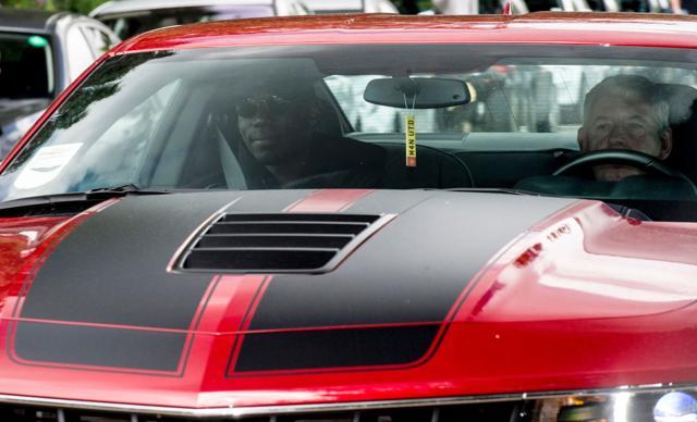 French footballer Paul Pogba (left) arrives in a convoy of vehicles at Manchester United's Carrington training complex, in Manchester. (AFP Photo)