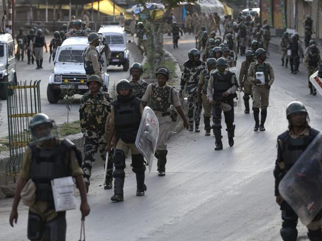 Security personnel walk back towards their base camp after a day long curfew in Srinagar, Monday, Aug. 8, 2016. (AP) Security personnel walk back towards their base camp after a day long curfew in Srinagar, Monday, Aug. 8, 2016. (AP)