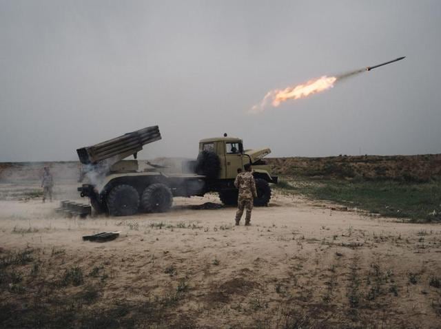 A rocket is fired from a rocket launcher outside Makhmour, about 75 km east of Mosul, Iraq. (AP File Photo) A rocket is fired from a rocket launcher outside Makhmour, about 75 km east of Mosul, Iraq. (AP File Photo)