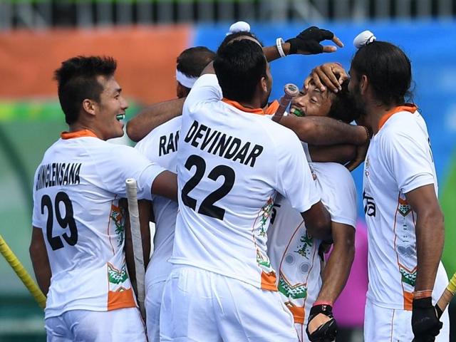 India's Rupinder Pal Singh gestures after the men's field hockey Argentina vs India match.(AFP Photo)