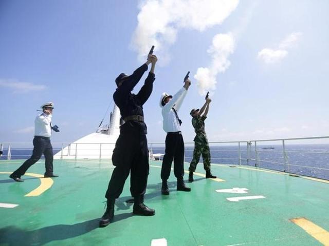 Soldiers of People's Liberation Army take part in a search and rescue exercise near Qilian Yu subgroup in the Paracel Islands, which is known in China as Xisha Islands, South China Sea, on July 14.(Reuters File)