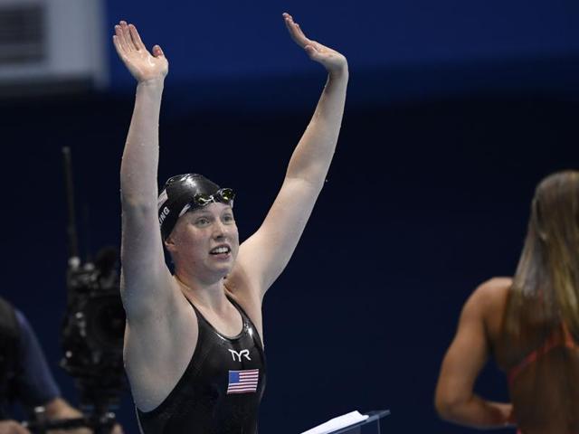 King waves to the crowd and USA supporters after exiting the pool. (AFP photo)