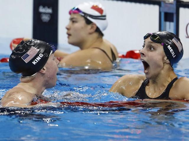 King and her USA teammate Katie Meili react after realising that the Olympic Record had fallen. (AFP photo)