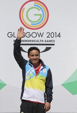 Jitu on the podium after winning the men's 50m pistol final of the Glasgow 2014 Commonwealth Games. (Getty Images)