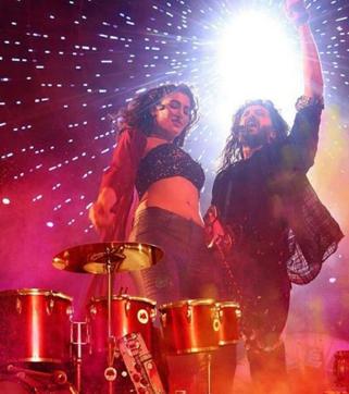 Nargis Fakhri and Riiteish Deshmukh in a still from Banjo.
