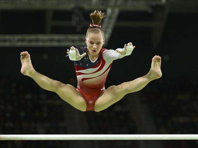 Madison Kocian (USA) competes on the uneven bars. (REUTERS) Madison Kocian (USA) competes on the uneven bars. (REUTERS)
