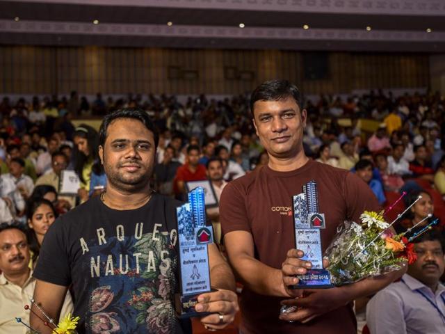 Lottery winners Anthony Cutinho and Ankur Johaari at Rangsharda Auditorium in Bandra on Wednesday.(Kunal Patil/HT)