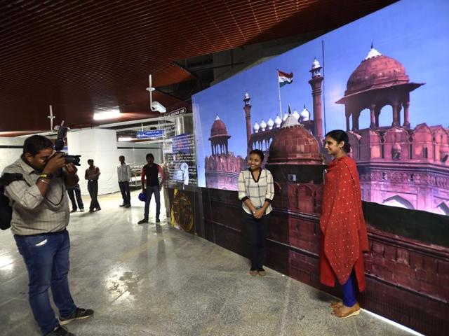 Delhi Metro is doing a trial run of its heritage line that will take thousands of commuters into the heart of the centuries-old walled city and add three new stations to the network. In this photograph, women pose before a picture of the Red Fort at the Delhi Gate Metro station on August 10, 2016. (AJay Aggarwal/HT PHOTO) Delhi Metro is doing a trial run of its heritage line that will take thousands of commuters into the heart of the centuries-old walled city and add three new stations to the network. In this photograph, women pose before a picture of the Red Fort at the Delhi Gate Metro station on August 10, 2016. (AJay Aggarwal/HT PHOTO)