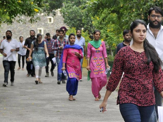 Candidates coming out after appearing in UPSC Preliminary Exam at Government College for Girls in Ludhiana on August 07, 2016. (Gurminder Singh/Hindustan Times)