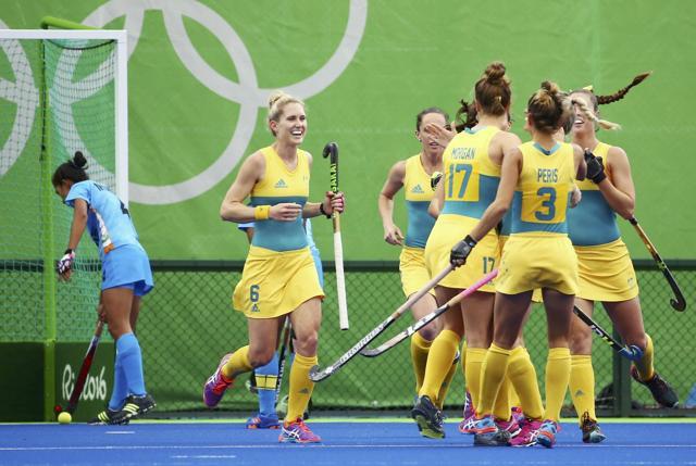 Australia celebrates after Georgie Parker scores. (REUTERS) Australia celebrates after Georgie Parker scores. (REUTERS)