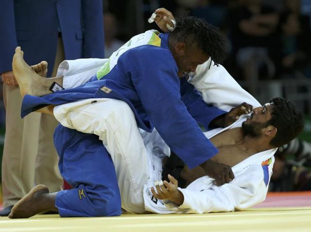 Avtar (in white) was penalised twice for non-combativity.(REUTERS)