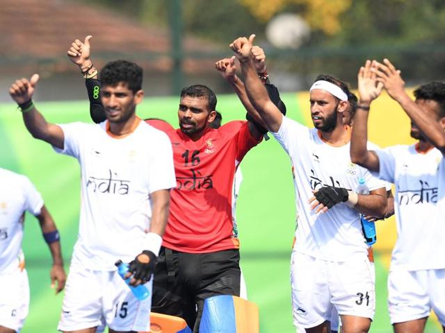 India's Sreejesh Parattu (second from left) celebrates with his teammates after the men's field hockey Argentina vs India match. (AFP) India's Sreejesh Parattu (second from left) celebrates with his teammates after the men's field hockey Argentina vs India match. (AFP)