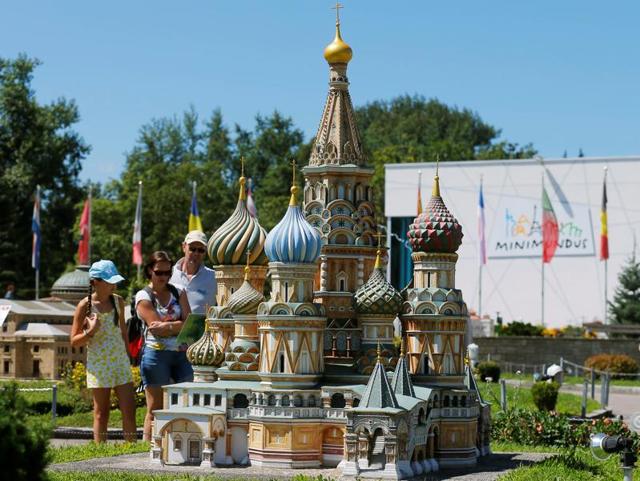 Minimundus theme park in Klagenfurt, Austria houses the miniatures of many iconic buildings from across the world. People look at a scale model of the Moscow Saint Basil's Cathedral on August 8, 2016. (REUTERS) Minimundus theme park in Klagenfurt, Austria houses the miniatures of many iconic buildings from across the world. People look at a scale model of the Moscow Saint Basil's Cathedral on August 8, 2016. (REUTERS)