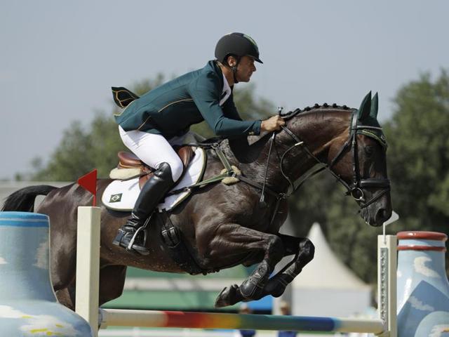 Ruy Fonseca of Brazil competes in the equestrian eventing show. (AP) Ruy Fonseca of Brazil competes in the equestrian eventing show. (AP)