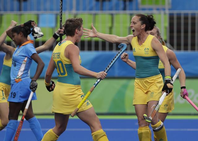 Australia's Kathryn Slattery, left, celebrates her goal with her teammate Australia's Madonna Blyth, right. (AP) Australia's Kathryn Slattery, left, celebrates her goal with her teammate Australia's Madonna Blyth, right. (AP)