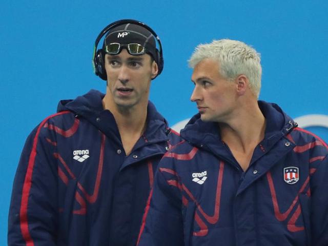 Michael Phelps and teammate Ryan Lochte arrive for the final of the men's 4x200-metre freestyle. (AP photo)