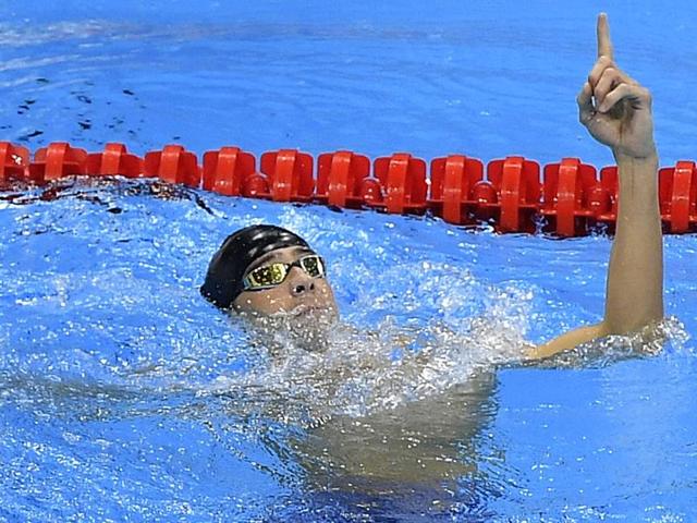 Phelps celebrates after completing the men's 4x200-metre freestyle relay final win. (AP Photo)