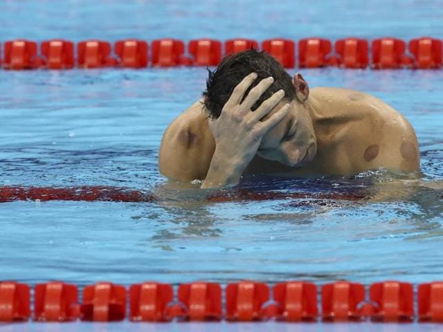 He is human guys! Phelps reacts after winning his 20th Olympic gold medal. (REUTERS photo)