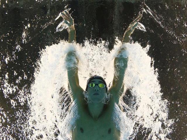 Michael Phelps (USA) competes on his way to winning the gold medal in the 200 metres butterfly final. Japan’s Masato Sakai took the silver medal and Hungary’s Tamas Kenderesi the bronze. (REUTERS) Michael Phelps (USA) competes on his way to winning the gold medal in the 200 metres butterfly final. Japan’s Masato Sakai took the silver medal and Hungary’s Tamas Kenderesi the bronze. (REUTERS)