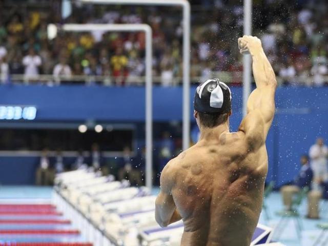 Celebrations continue even after exiting the pool. (REUTERS PHOTO)