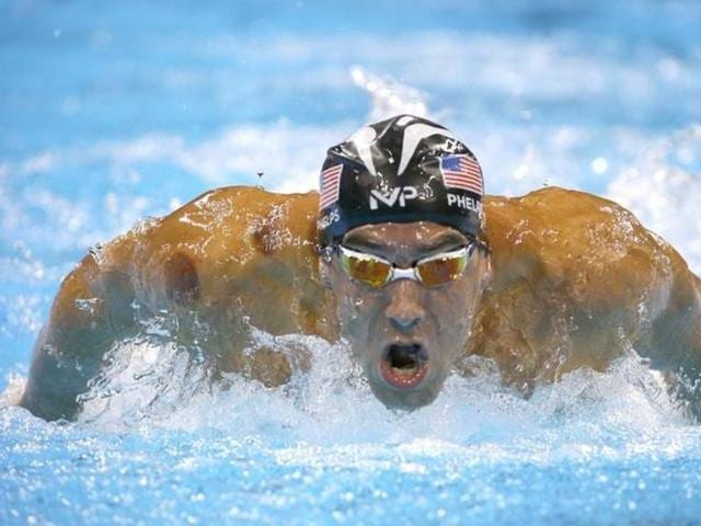 Michael Phelps reacts after receiving his gold medal.(REUTERS photo)