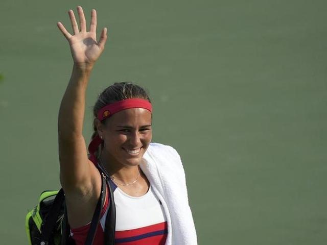 Monica Puig celebrates after winning her match against third seed Garbine Muguruza 6-1, 6-1. (REUTERS PHOTO) Monica Puig celebrates after winning her match against third seed Garbine Muguruza 6-1, 6-1. (REUTERS PHOTO)
