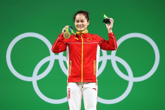 China’s Deng Wei has broken the world record to win gold in women’s 63-kilogram weightlifting. (Getty Images) China’s Deng Wei has broken the world record to win gold in women’s 63-kilogram weightlifting. (Getty Images)