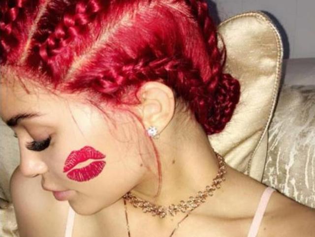 The youngest of the Kardashian clan stepped into her last year as a teenager on Wednesday. To make the day feel grand, she dyed her hair red and tied them into the currently-very-fashionable cornrows.(Instagram)